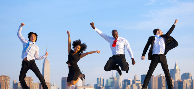 Happy Successful Business People Celebrating and Jumping in New York City